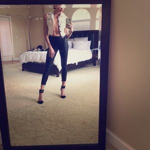 White sleeveless jean jacket